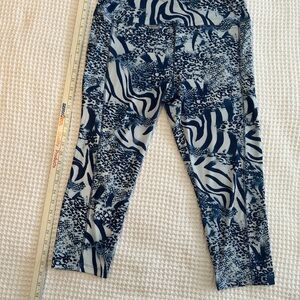 Workout leggings soft blue & white, repels moisture pocket for keys or phone.